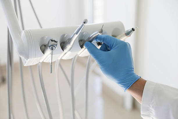Professional Tooth Extraction technician working in Riverwoods, IL
